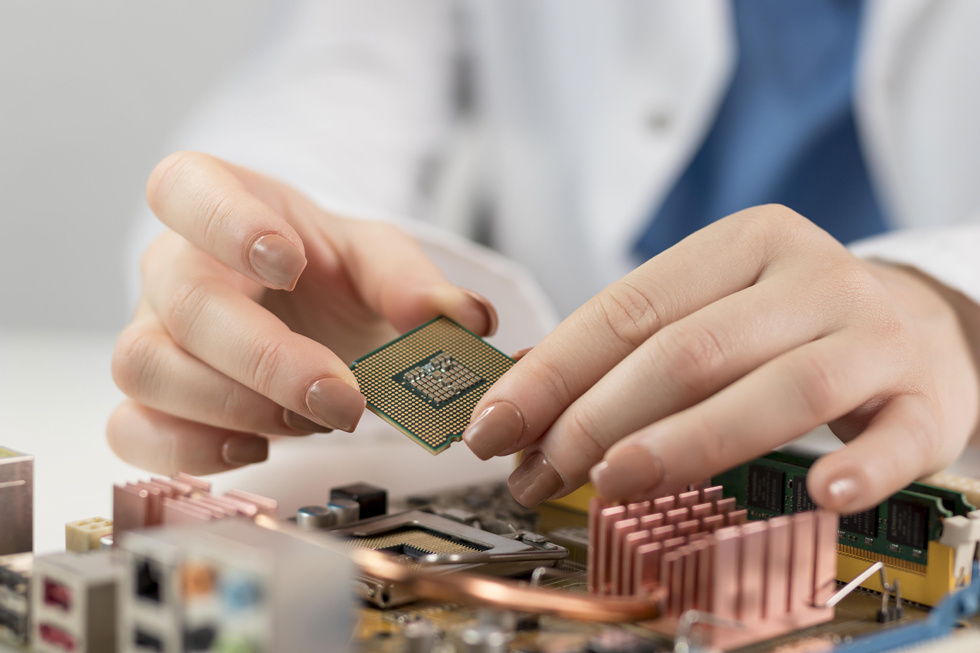 close-up-researcher-holding-chip